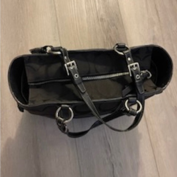 It’s a large signature C coach logo printed all over it - Picture 3 of 15